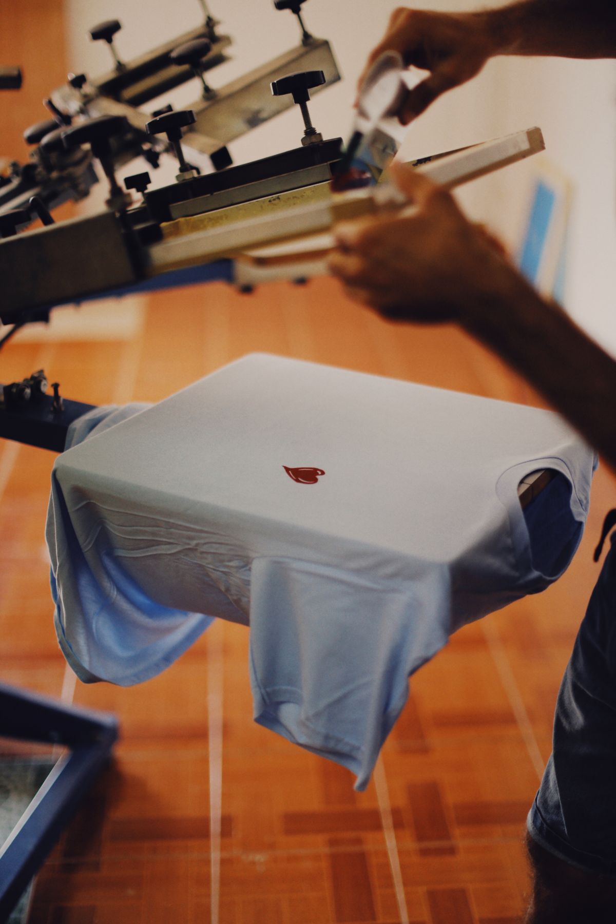 T-shirt being printed on a garment printing machine