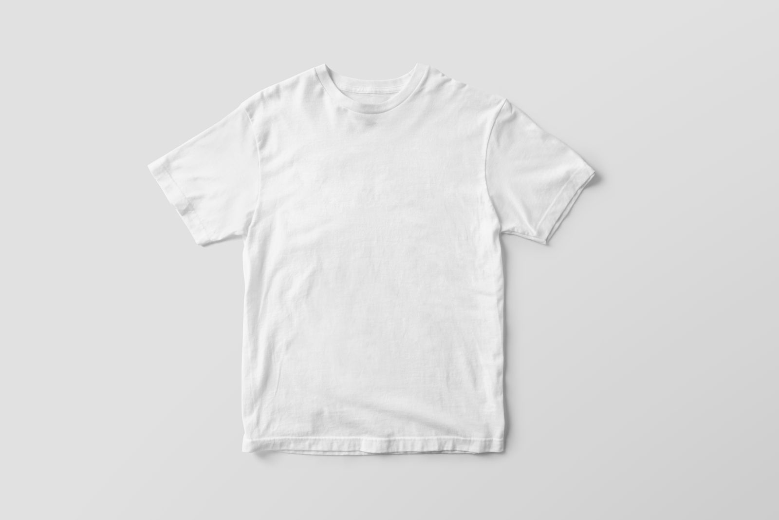 Blank white t-shirt mockup on a grey background